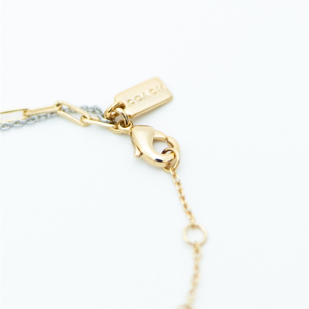 Coach Two-Tone Gold and Silver Bracelet with Lock and Key Charms - Picture 3 of 3